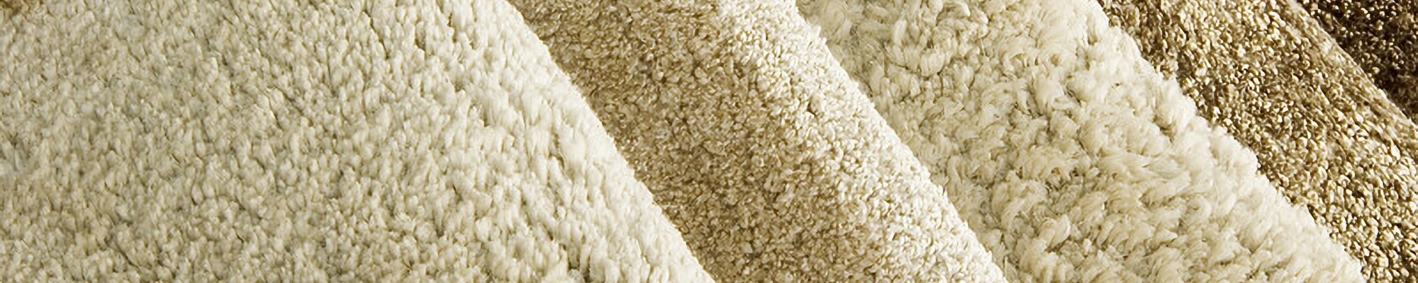 Rolls of beige carpet